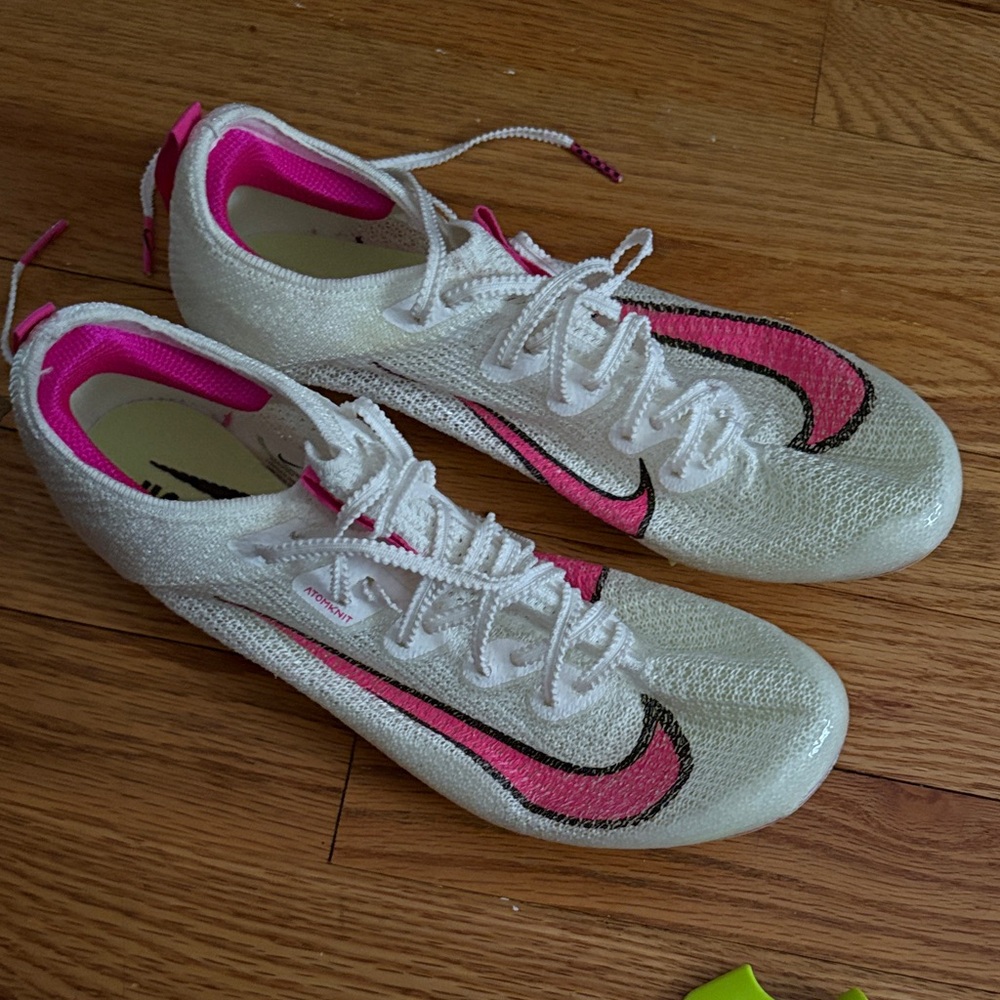Nike Women's White Athletic Shoes with Pink Accents